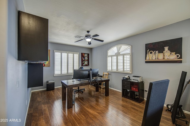 office area featuring baseboards, ceiling fan, and hardwood / wood-style flooring