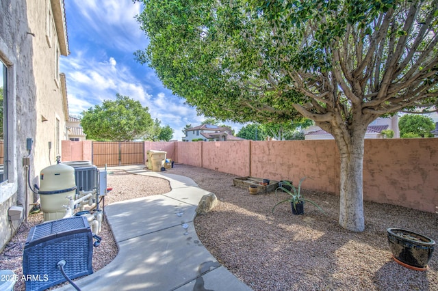 view of yard with a patio and a fenced backyard