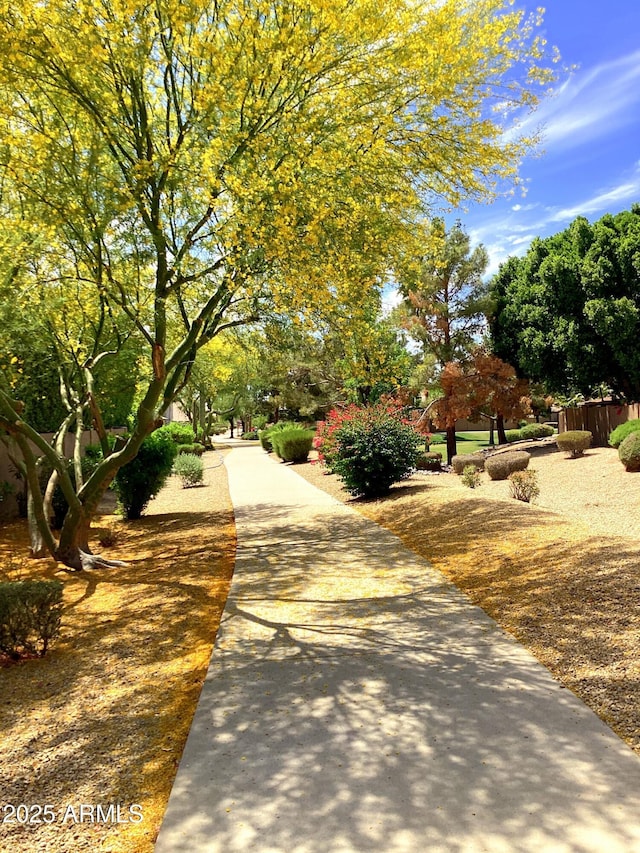surrounding community featuring fence
