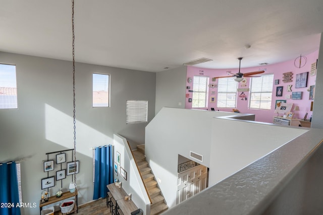 interior space featuring ceiling fan and hardwood / wood-style floors