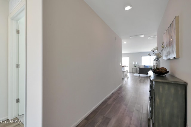 1234 N 13th St, Coolidge, AZ 85128 - hallway featuring wood finished floors and baseboards