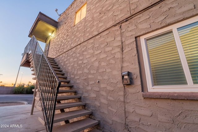 view of property exterior at dusk