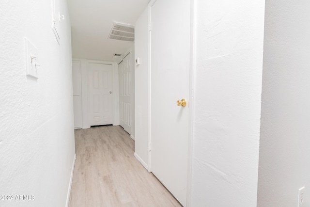 hallway featuring light wood-type flooring