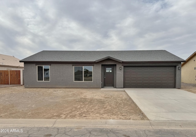 single story home featuring a garage