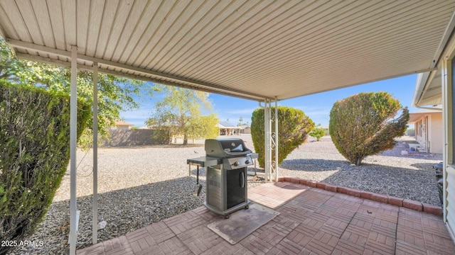 view of patio / terrace with a fenced backyard and area for grilling