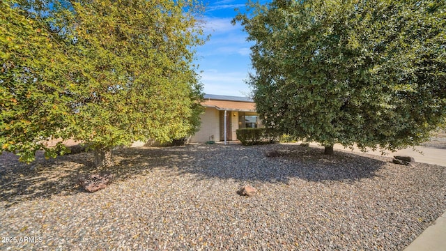 view of front of property with brick siding