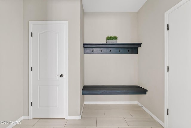 mudroom featuring baseboards