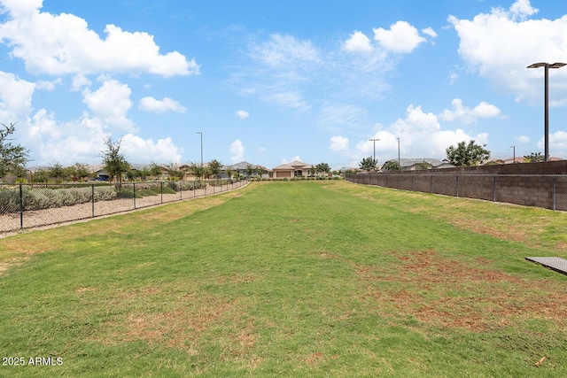 view of yard featuring a fenced backyard