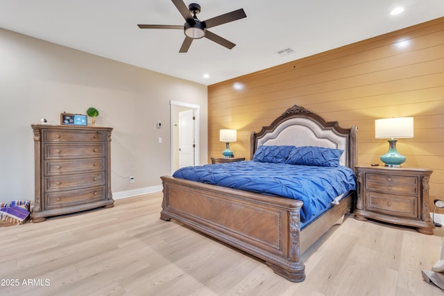 bedroom with recessed lighting, a ceiling fan, baseboards, visible vents, and light wood-style floors