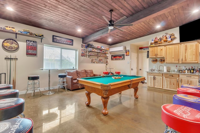 recreation room with a wall unit AC, recessed lighting, wet bar, beamed ceiling, and finished concrete floors