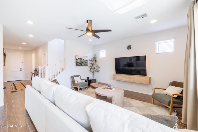 living room with ceiling fan