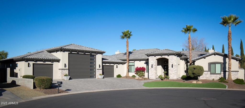 view of front of property featuring a garage