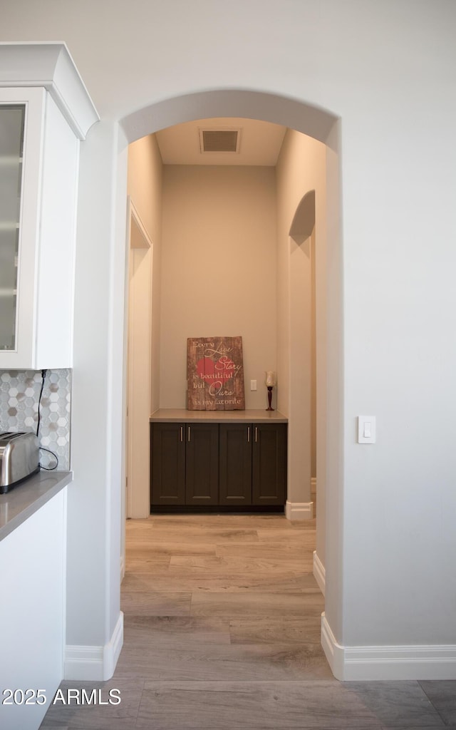 hallway featuring light hardwood / wood-style floors