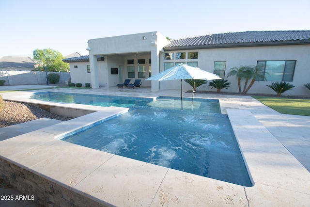 view of swimming pool with a patio