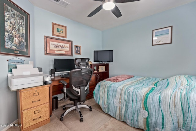 bedroom with light carpet and ceiling fan