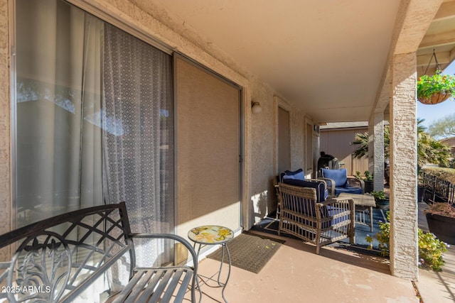 balcony featuring a patio area