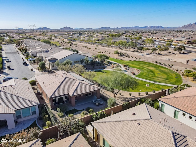 birds eye view of property featuring a mountain view