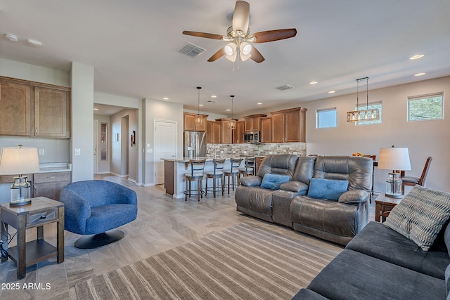 living room featuring ceiling fan