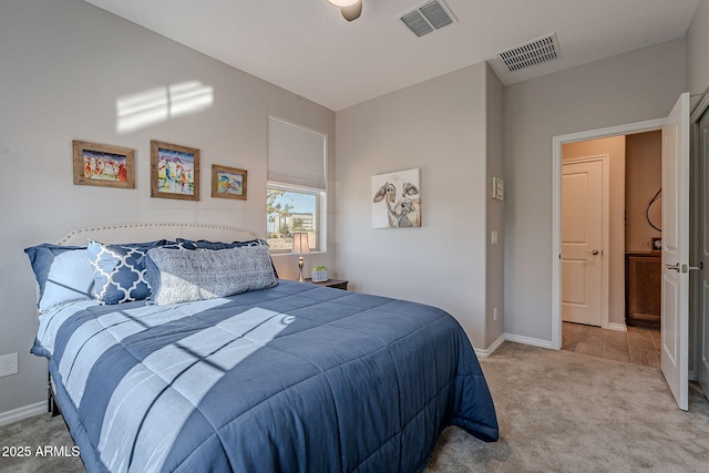 bedroom featuring ceiling fan and light colored carpet