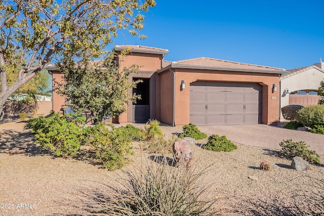 view of front of property featuring a garage