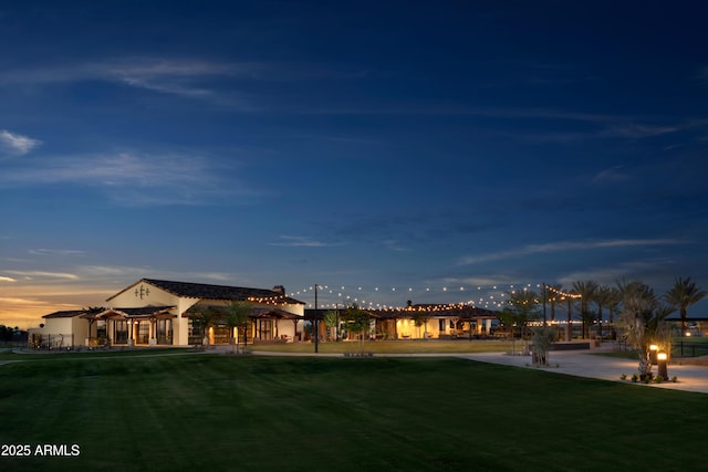 view of home's community featuring a yard