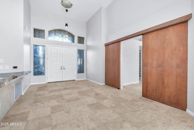 entrance foyer with a high ceiling