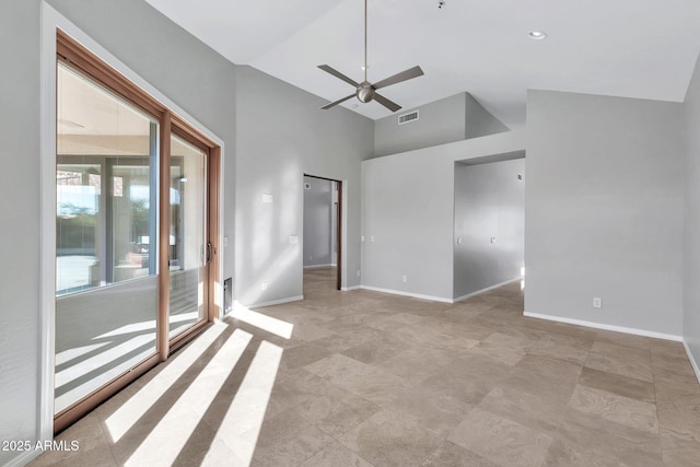 unfurnished room featuring ceiling fan and high vaulted ceiling