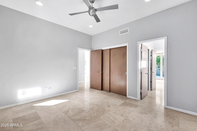 unfurnished bedroom with a closet and ceiling fan