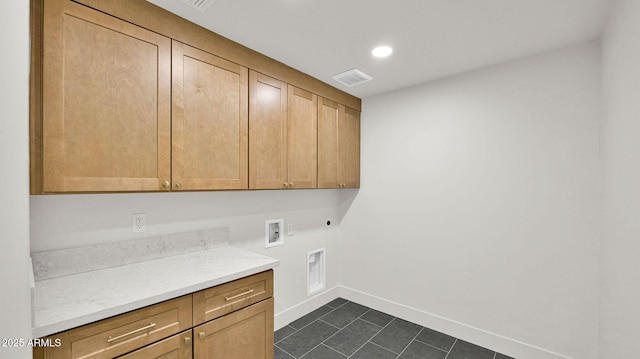 5109 E Blanche Dr, Scottsdale, AZ 85254 - washroom featuring cabinet space, hookup for an electric dryer, washer hookup, baseboards, and dark tile patterned flooring