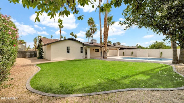 5109 E Blanche Dr, Scottsdale, AZ 85254 - back of house with stucco siding, solar panels, a garage, a patio area, and driveway