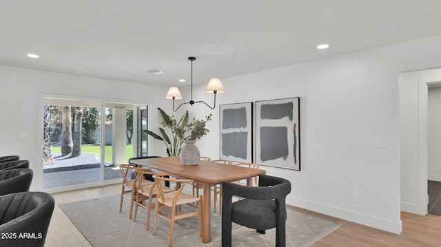 5109 E Blanche Dr, Scottsdale, AZ 85254 - dining room featuring light wood-style flooring, recessed lighting, baseboards, and a chandelier
