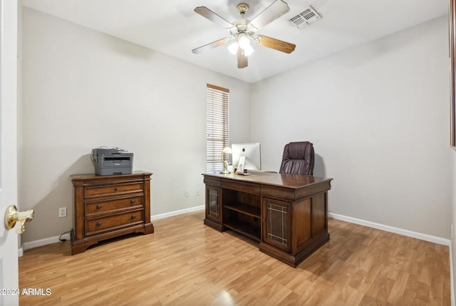 office area with light hardwood / wood-style floors and ceiling fan