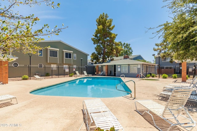 2301 E University Dr Unit 233, Mesa, AZ 85213 - community pool featuring a patio area and fence