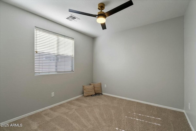 carpeted empty room with ceiling fan