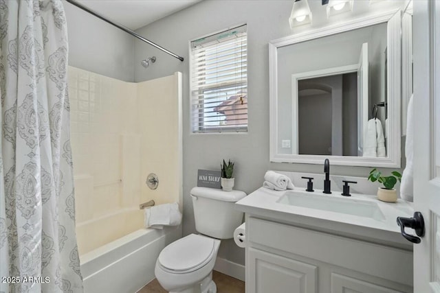 full bathroom featuring vanity, toilet, and shower / bath combo with shower curtain