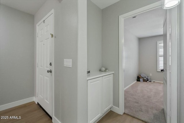 hall featuring light wood-type flooring