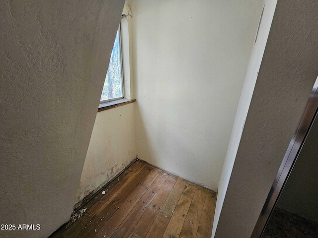 empty room featuring dark hardwood / wood-style flooring