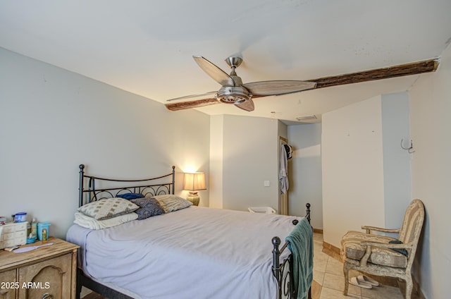 bedroom with light tile patterned floors and a ceiling fan