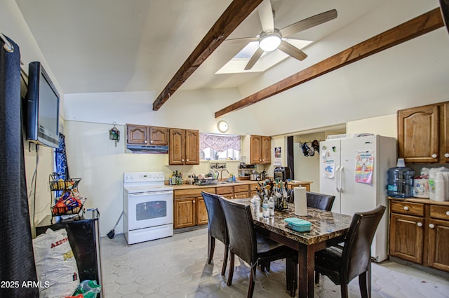 kitchen with vaulted ceiling with beams, under cabinet range hood, white appliances, light countertops, and brown cabinetry