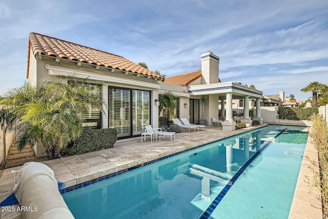 rear view of house with a patio