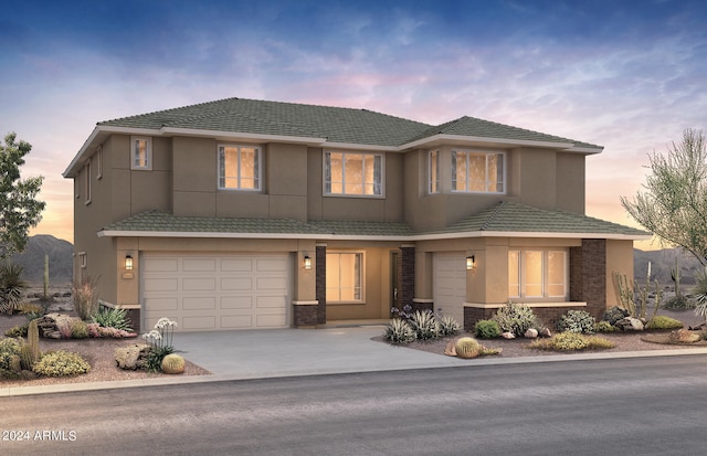 view of front of property featuring a garage