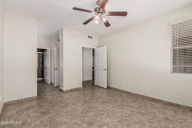 9550 E Thunderbird Rd Unit 149, Scottsdale, AZ 85260 - unfurnished bedroom featuring baseboards, a ceiling fan, and visible vents