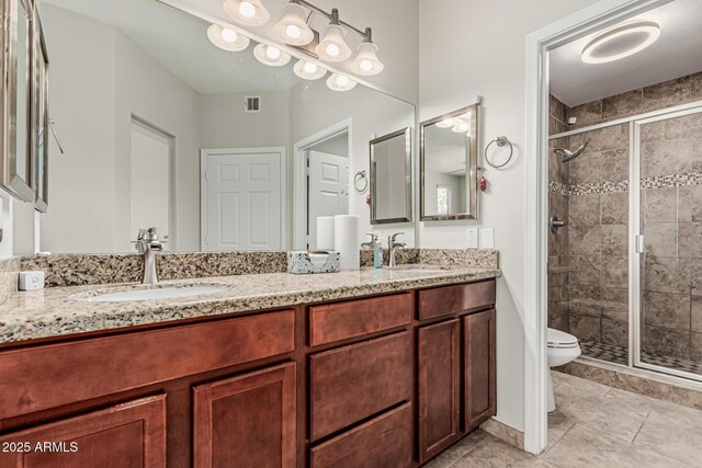 9550 E Thunderbird Rd Unit 149, Scottsdale, AZ 85260 - full bathroom with a shower stall, toilet, a sink, and visible vents