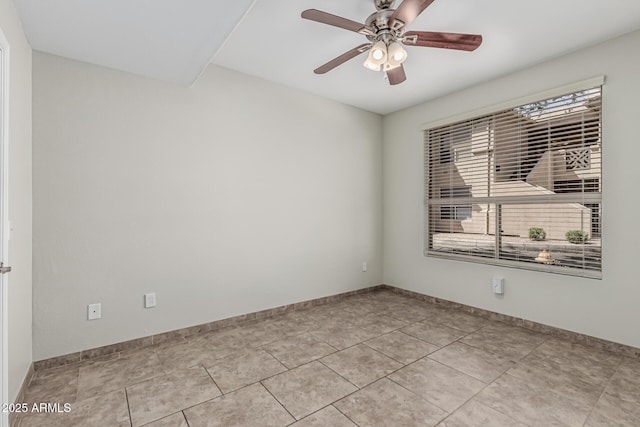 9550 E Thunderbird Rd Unit 149, Scottsdale, AZ 85260 - tiled spare room with baseboards and a ceiling fan