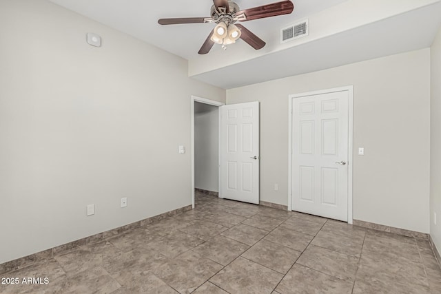 9550 E Thunderbird Rd Unit 149, Scottsdale, AZ 85260 - unfurnished bedroom featuring baseboards, a ceiling fan, and visible vents
