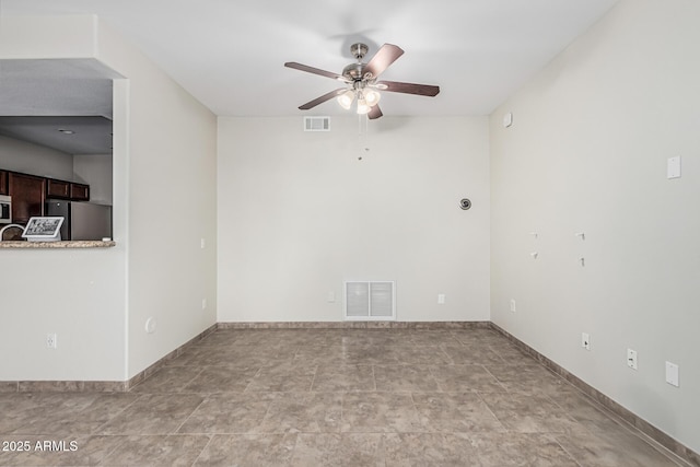 9550 E Thunderbird Rd Unit 149, Scottsdale, AZ 85260 - empty room with visible vents, a ceiling fan, and baseboards