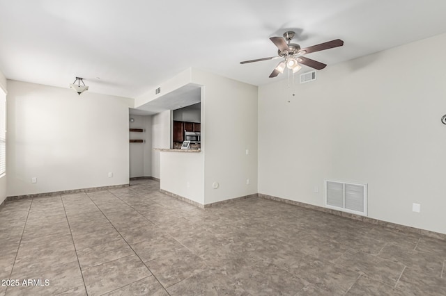 9550 E Thunderbird Rd Unit 149, Scottsdale, AZ 85260 - unfurnished living room featuring baseboards, a ceiling fan, and visible vents