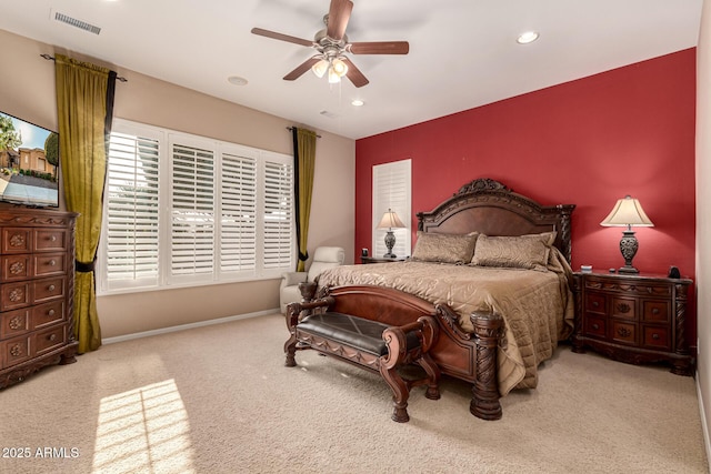 carpeted bedroom featuring ceiling fan