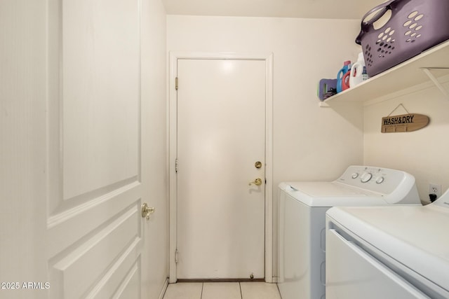 4441 E Desert Wind Dr, Phoenix, AZ 85044 - washroom featuring washer and dryer and light tile patterned floors