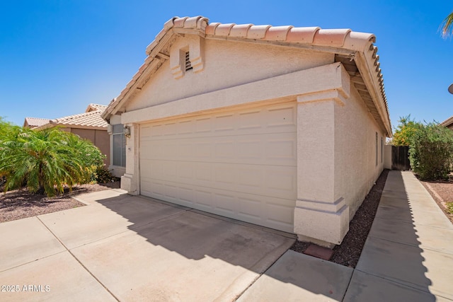 4441 E Desert Wind Dr, Phoenix, AZ 85044 - view of front facade with stucco siding and a tiled roof